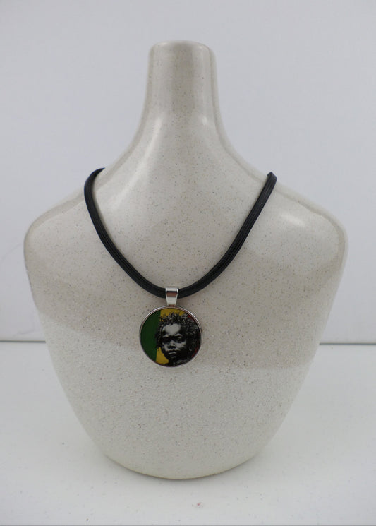 1-10023 *Rastafari Round Pendant and Cord - Rasta Baby