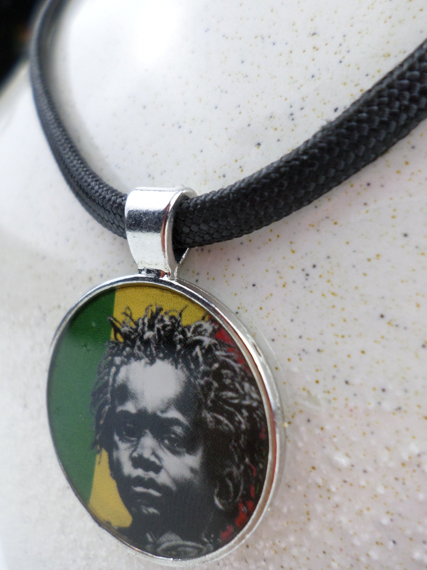 1-10023 *Rastafari Round Pendant and Cord - Rasta Baby