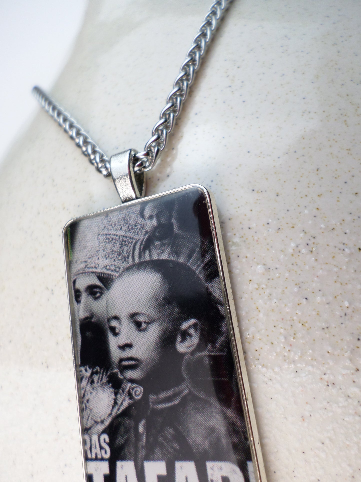 1-10009 *Rastafari Pendant and Chain - H.I.M. - Black and White