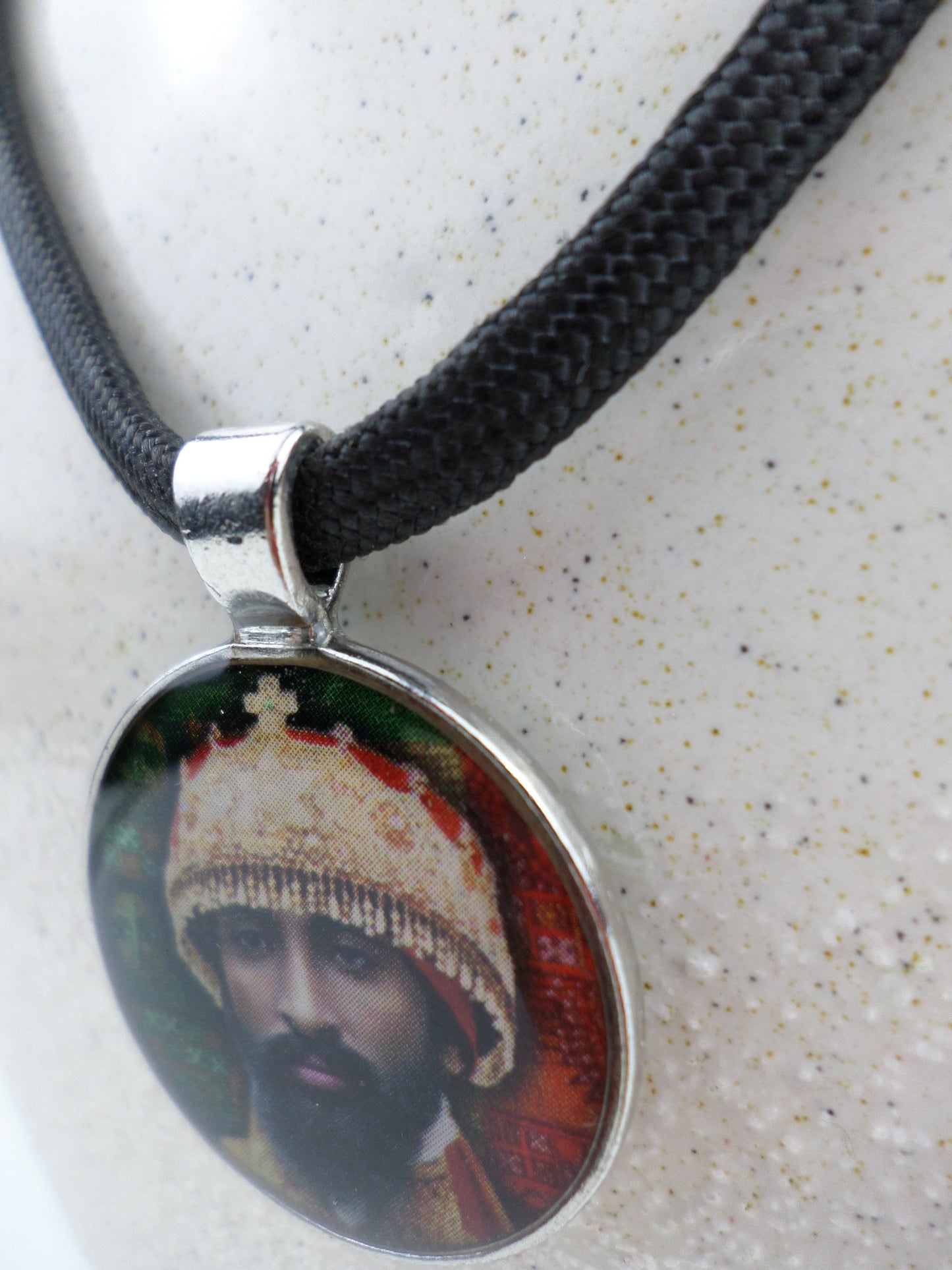 1-10025 *Rastafari Round Pendant and Cord - H.I.M. of Ethiopia